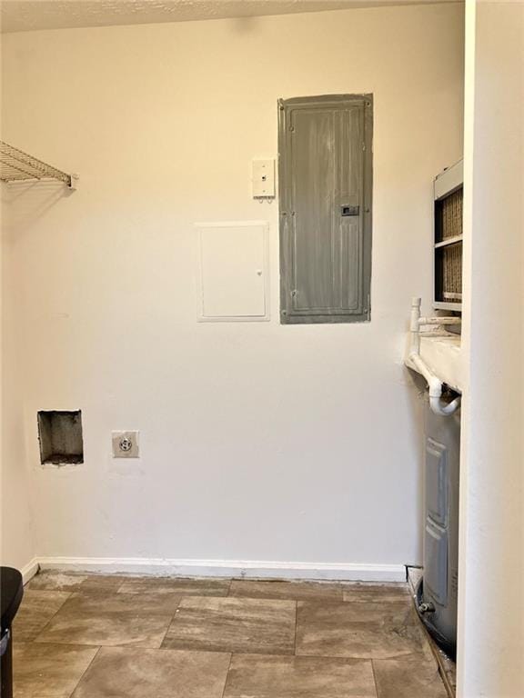 laundry area with hookup for an electric dryer and electric panel