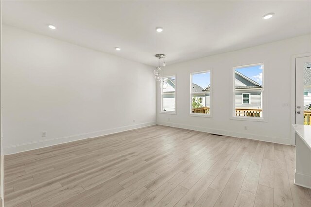 1937 Quarry Park Pl NW, Atlanta, GA 30318 - unfurnished room featuring light wood-style floors, baseboards, and recessed lighting