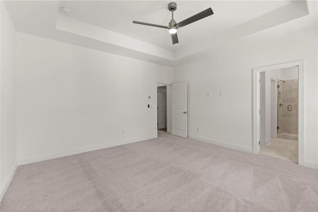 1937 Quarry Park Pl NW, Atlanta, GA 30318 - unfurnished bedroom with a tray ceiling, carpet flooring, baseboards, and ensuite bath