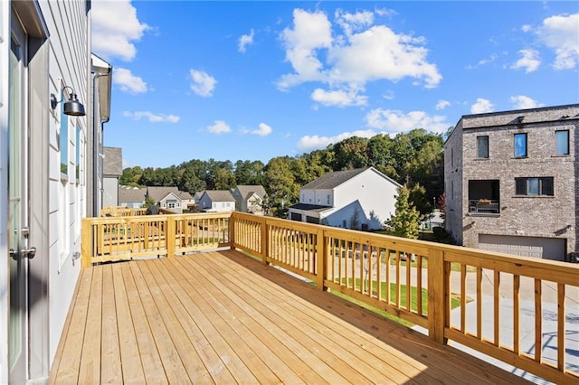 wooden deck featuring a residential view