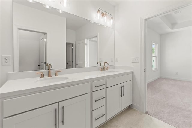 1937 Quarry Park Pl NW, Atlanta, GA 30318 - bathroom with double vanity and baseboards