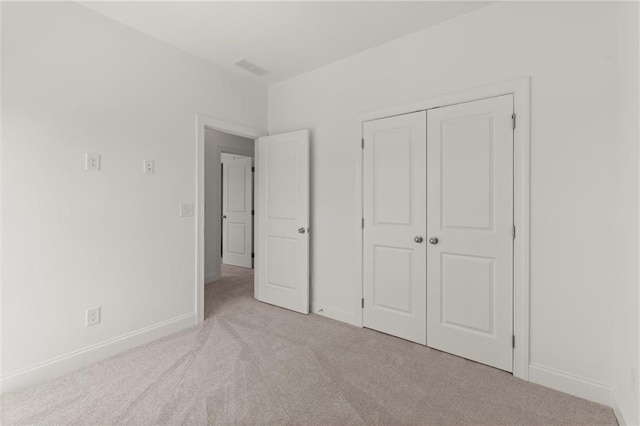 1937 Quarry Park Pl NW, Atlanta, GA 30318 - unfurnished bedroom featuring carpet flooring, baseboards, and a closet