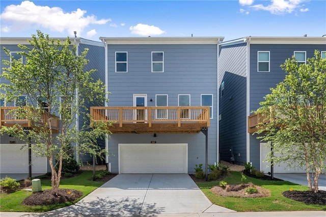 1937 Quarry Park Pl NW, Atlanta, GA 30318 - back of property with a garage, driveway, and a balcony