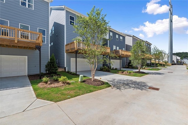 1937 Quarry Park Pl NW, Atlanta, GA 30318 - view of building exterior with an attached garage, driveway, and a residential view