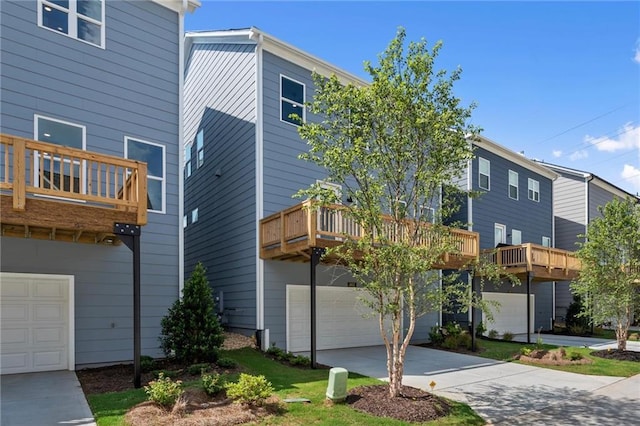 1937 Quarry Park Pl NW, Atlanta, GA 30318 - exterior space with a balcony, a garage, and driveway