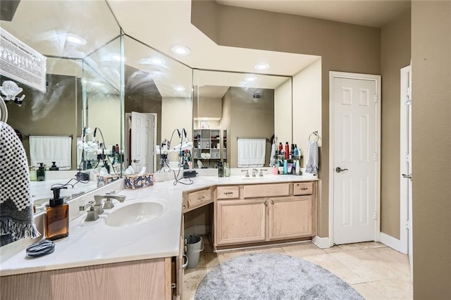 3777 Peachtree Rd NE Unit 438, Brookhaven, GA 30319 - bathroom with tile patterned floors, double vanity, and recessed lighting