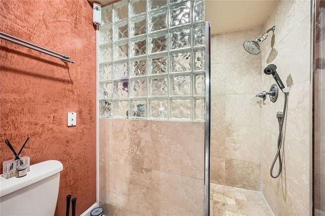 3777 Peachtree Rd NE Unit 438, Brookhaven, GA 30319 - bathroom featuring tiled shower