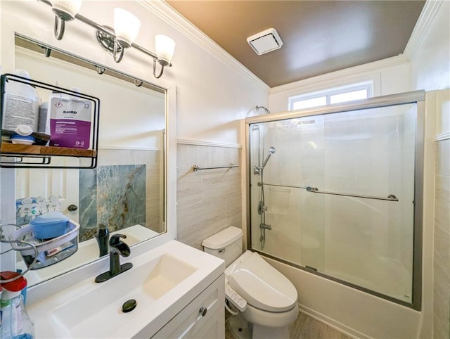 2355 Quail Creek Ter, Buford, GA 30519 - full bathroom with tile walls, vanity, ornamental molding, and enclosed tub / shower combo