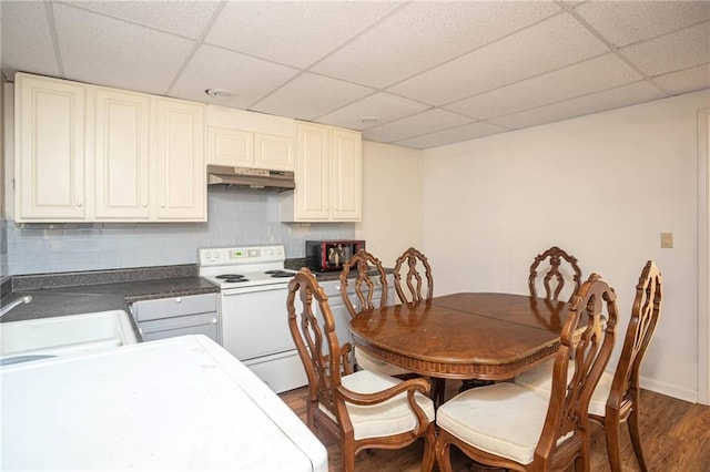 2355 Quail Creek Ter, Buford, GA 30519 - dining area with a drop ceiling and dark wood-type flooring
