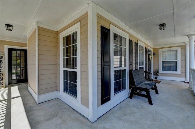 view of patio featuring a porch