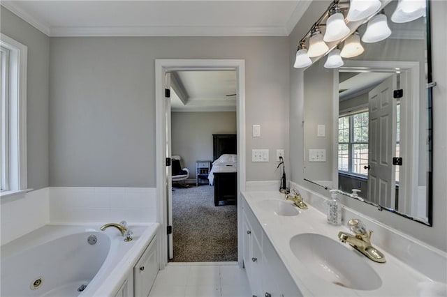 bathroom featuring a sink, ensuite bath, a jetted tub, and crown molding