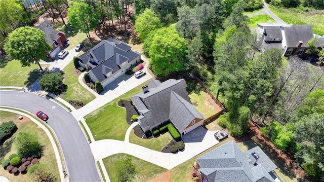 birds eye view of property with a residential view