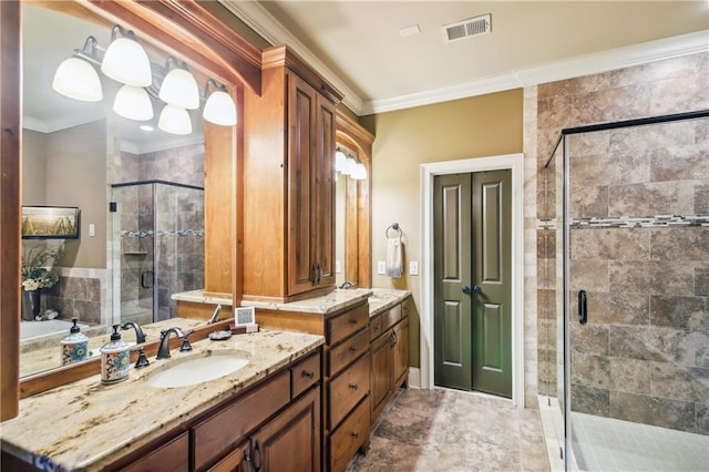 bathroom with crown molding, visible vents, a stall shower, and vanity