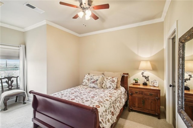 bedroom featuring ceiling fan, light colored carpet, ornamental molding, visible vents, and baseboards