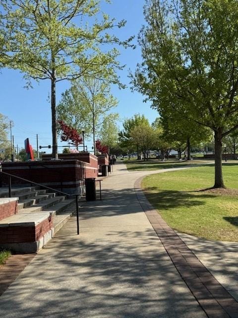 surrounding community featuring a yard