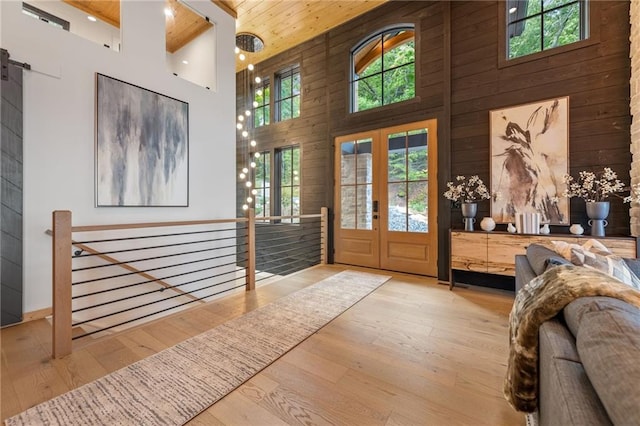146 Overlook Way, Blue Ridge, GA 30513 - entrance foyer with a towering ceiling, wooden ceiling, healthy amount of natural light, wood finished floors, and wooden walls