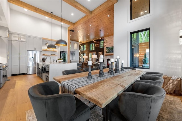 146 Overlook Way, Blue Ridge, GA 30513 - dining room featuring a high ceiling, recessed lighting, light wood finished floors, a chandelier, and beam ceiling