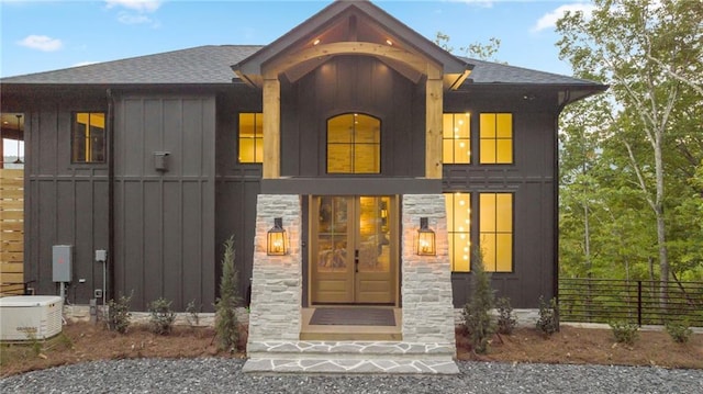 146 Overlook Way, Blue Ridge, GA 30513 - view of front facade with board and batten siding, a shingled roof, and stone siding
