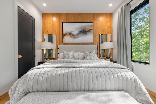 146 Overlook Way, Blue Ridge, GA 30513 - bedroom featuring recessed lighting, wooden walls, baseboards, and wood finished floors