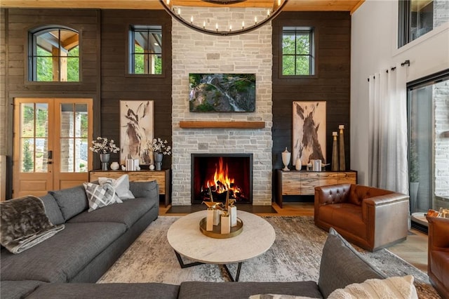 146 Overlook Way, Blue Ridge, GA 30513 - living room with a towering ceiling, plenty of natural light, wood finished floors, a fireplace, and wooden walls