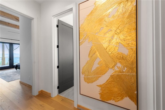 146 Overlook Way, Blue Ridge, GA 30513 - hall featuring light wood-type flooring, baseboards, and french doors