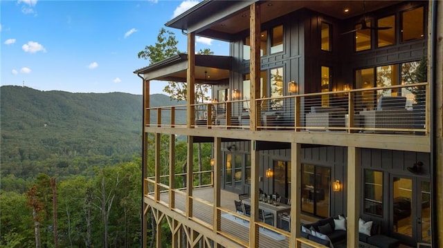 146 Overlook Way, Blue Ridge, GA 30513 - rear view of property with board and batten siding, a forest view, a balcony, and a mountain view