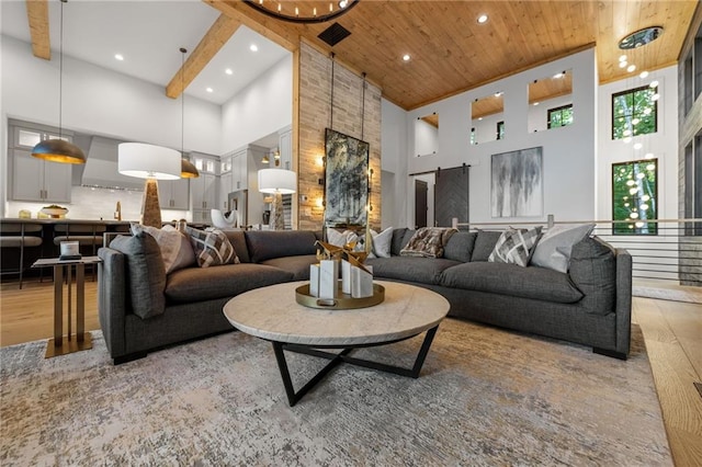 146 Overlook Way, Blue Ridge, GA 30513 - living room featuring a barn door, a towering ceiling, light wood-style flooring, recessed lighting, and wooden ceiling