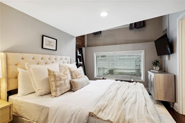 bedroom featuring hardwood / wood-style floors