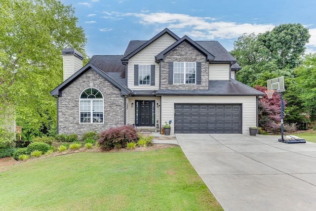 view of front facade featuring a garage and a front lawn