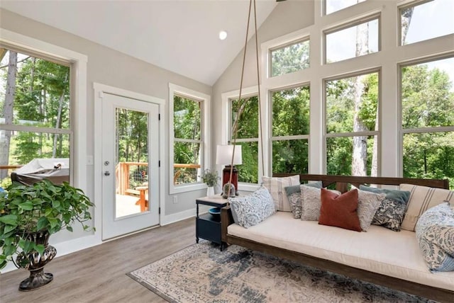 sunroom with lofted ceiling