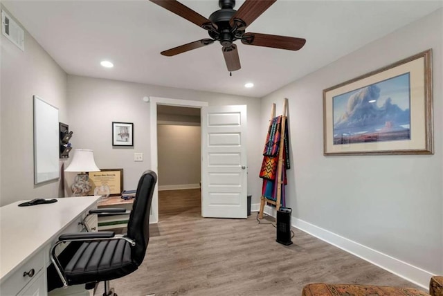 home office featuring ceiling fan and light wood-type flooring