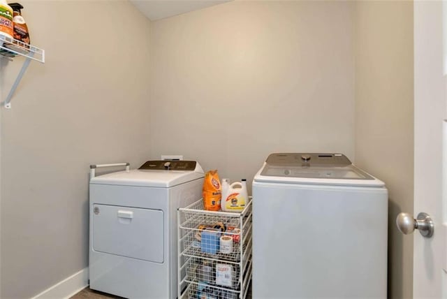 washroom featuring washer and dryer