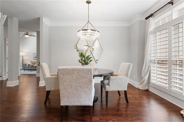 dining space with baseboards, ceiling fan with notable chandelier, and dark wood-style floors