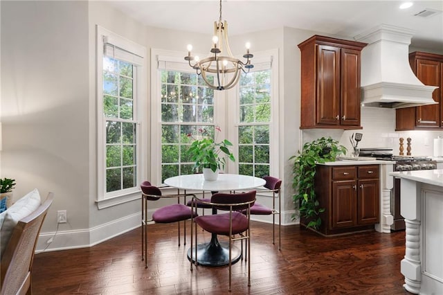 dining area with visible vents, baseboards, a notable chandelier, recessed lighting, and dark wood-type flooring