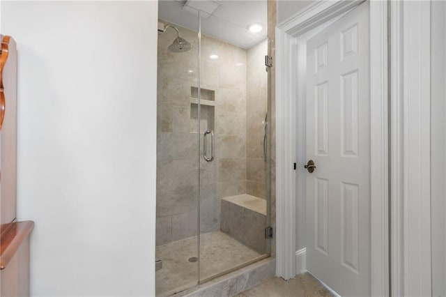 bathroom featuring recessed lighting and a stall shower