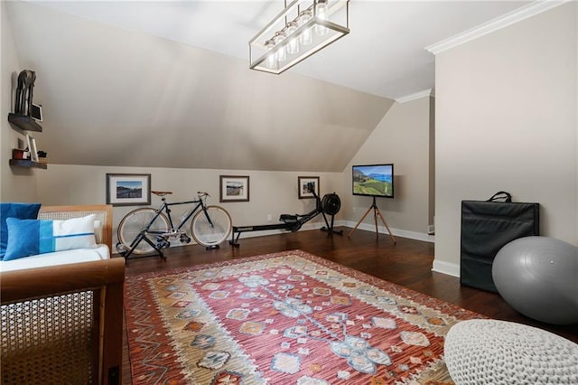 sitting room with baseboards, wood finished floors, and lofted ceiling