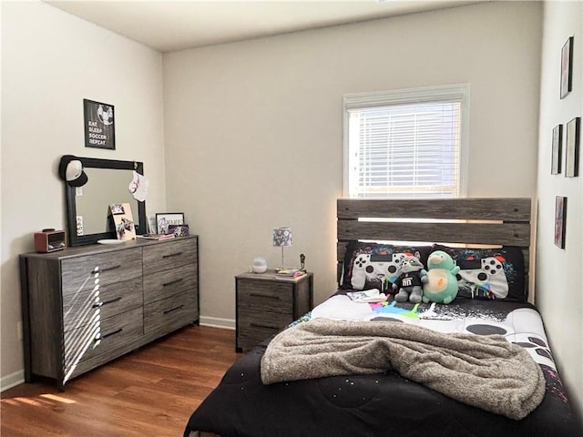 bedroom featuring dark hardwood / wood-style floors