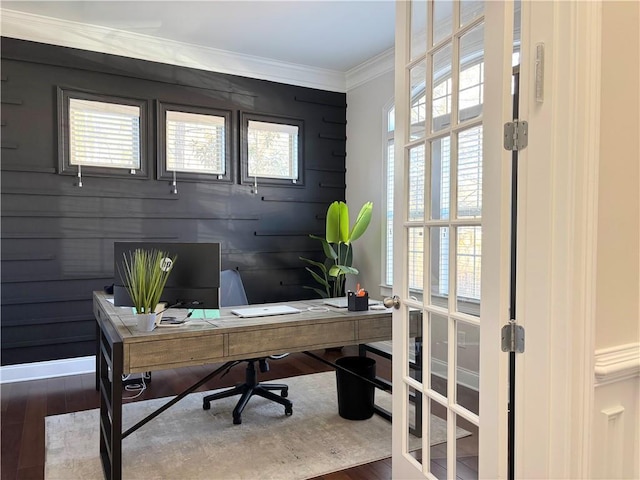 home office with crown molding and wood-type flooring