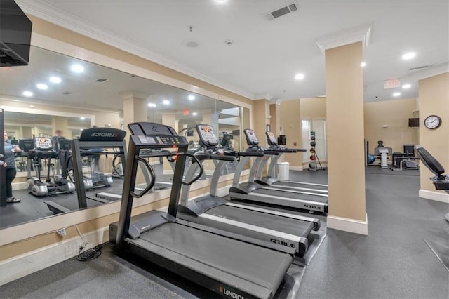 gym with ornamental molding