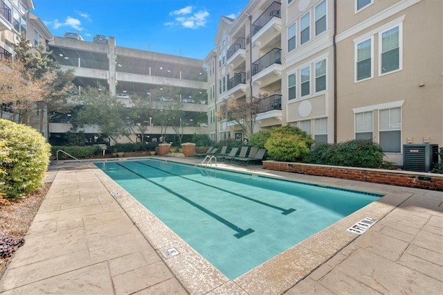 view of pool with cooling unit