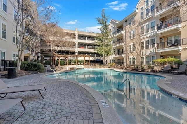 view of pool featuring a patio area