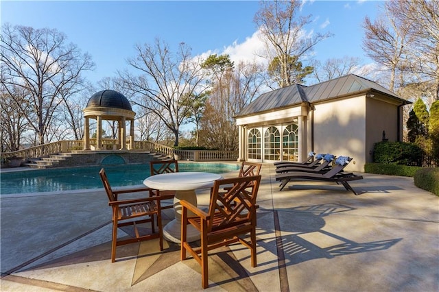 view of patio / terrace with an outdoor structure