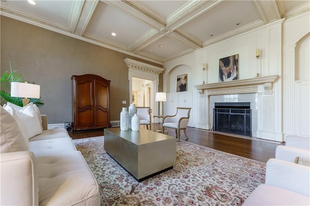 living room with beamed ceiling, coffered ceiling, dark hardwood / wood-style floors, and crown molding