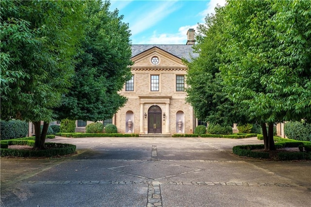 view of neoclassical home