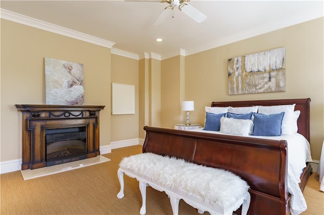 bedroom featuring ornamental molding, ceiling fan, and carpet flooring