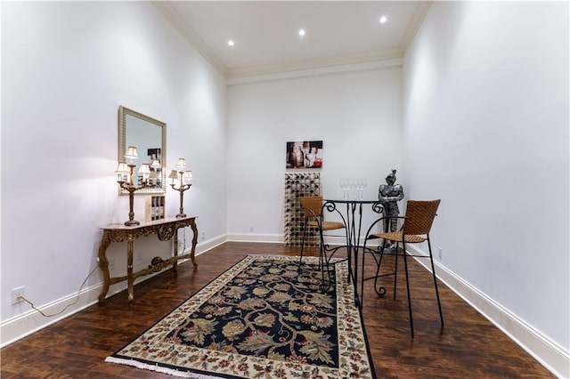 office area featuring crown molding, a brick fireplace, and dark hardwood / wood-style floors