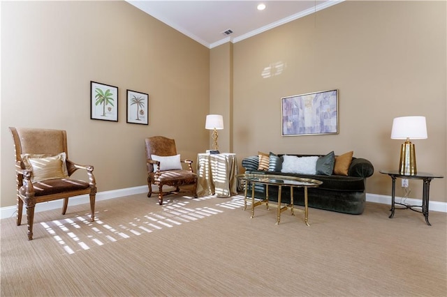 sitting room with ornamental molding, a towering ceiling, and light carpet