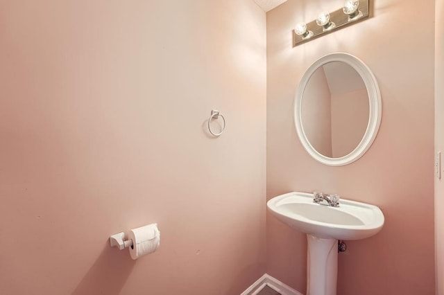 bathroom featuring baseboards