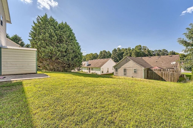 view of yard with fence