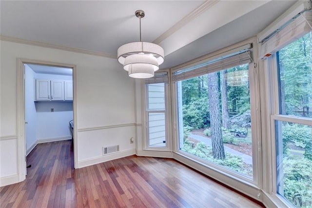 5507 Martina Way, Dunwoody, GA 30338 - unfurnished dining area featuring wood finished floors, ornamental molding, and baseboards